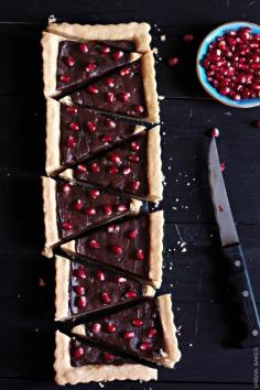 
                    
                        Shortbread Tart filled with a Smooth Dark Chocolate Ganache and Pomegranate Arils
                    
                