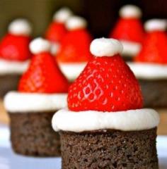 Easy last minute Christmas treat. Buy brownie bites, strawberries, and a can of whipped cream. Strawberry Santa Hat Brownies!