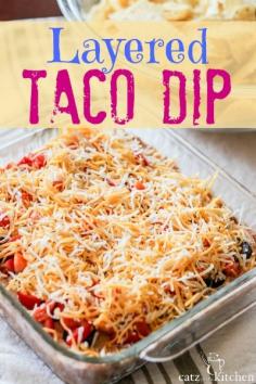 
                    
                        DELICIOUS! This dish is perfect for potlucks, baby shower spreads, taco nights, movie nights. It's little to no work at all---and always a hit on whatever table it's placed! Layered Taco Dip by @Catz in the Kitchen
                    
                
