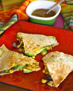 Roasted Corn, Black Bean and Avocado Quesadillas. Skip the sour cream and do vegan cheese instead. Looks delish!