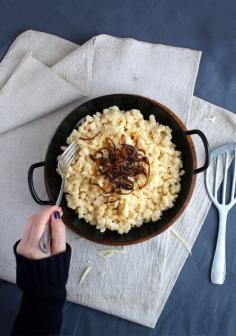 
                    
                        CHEESE SPAETZLE WITH CARAMELIZED ONIONS
                    
                