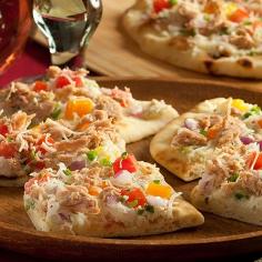 
                    
                        This pizza has a fantastic tuna melt flavor with crunchy vegetables and a thin crispy crust.
                    
                