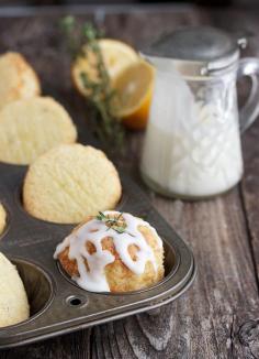 
                    
                        GLAZED LEMON AND THYME OLIVE OIL CAKES
                    
                