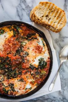 
                    
                        FARM EGGS WITH BRAISED GREENS & TOMATO
                    
                