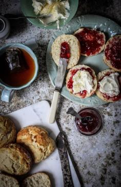 
                    
                        devon cream tea traditional english scones with cream and jam.
                    
                