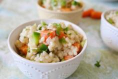 
                    
                        ISRAELI COUSCOUS WITH HEARTS OF PALM
                    
                
