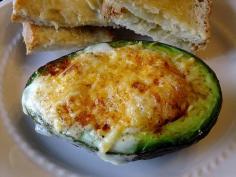 Baked avocado with egg, cheese and bacon