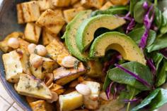 
                    
                        healthy salad with avocados, sweet potatoes, tofu and almonds
                    
                