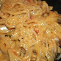 
                    
                        Chicken Spaghetti recipe .....  Ingredients 1	lb boneless, skinless chicken breasts 1	lb velveeta cheese, regular or mexican 1	can rotel tomatoes, regular or hot 1	lb spaghetti pasta 1	stk butter 1	can cream of chicken soup, undiluted 1	can cream of mushroom soup, undiluted 1	medium onion, chopped 1	bell pepper, red or green, chopped salt and pepper to taste
                    
                