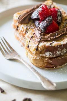 
                    
                        COCONUT WHIPPED CREAM BRIOCHE FRENCH TOAST WITH CHOCOLATE COVERED STRAWBERRIES
                    
                