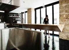 
                    
                        Atelier JMCA, a Parisian architecture & design studio, have designed a creative solution for a restaurant in Paris. The designers were challenged by the restaurant’s confined space, and had to be meticulous and inventive. One of their solutions was a long cantilevered prism, that acts as a table and a counter/bar.
                    
                