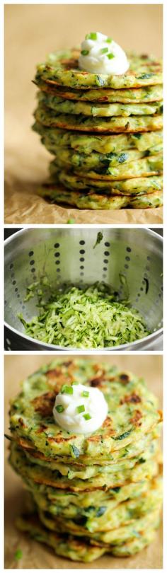 Zucchini Fritters - These fritters are unbelievably easy to make, low calorie, and the perfect way to sneak in some veggies! - use coconut flour and nutritional yeast to make it paleo, or omit the cheese.