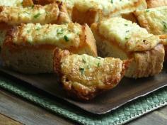 
                    
                        This Cheesy Bread Recipe is Topped with Kimchi Butter and Six Cheeses #food trendhunter.com
                    
                