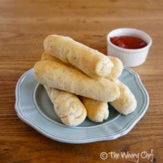 
                    
                        Cheese Stuffed Breadsticks - These breadsticks made with #bisquick and #cheese sticks are fun and easy to make!
                    
                