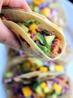 
                    
                        Grilled Chili-Lime Fish Tacos with Sour Cream Cabbage Slaw + Mango & Avocado
                    
                