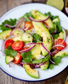 Avocado, red onion, cherry tomatoes, cilantro, olive oil, tabasco (optional), lime, and black pepper ♥ summer salad time