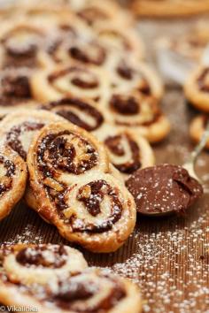 
                    
                        Nutella and Hazelnut Palmiers, they taste like crispy chocolate croissants. Absolutely beautiful with your cup of coffee.
                    
                