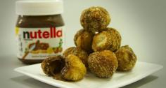
                    
                        Dominique Ansel Bakery is Debuting Nutella Cronut Holes in NYC #nutella trendhunter.com
                    
                
