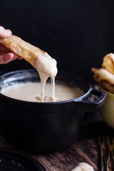 
                    
                        Smoky 3 Cheese Fondue with Toasted Garlic Buttered Croissants
                    
                