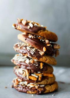 
                    
                        chocolate-dipped peanut butter cookies with pretzels
                    
                