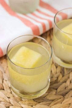 
                    
                        Fizzy Pineapple Ginger Cocktails with Pineapple Ice Cubes
                    
                