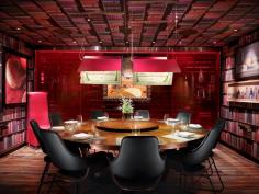 
                    
                        Jaleo (Las Vegas, Nevada) An intimate dining area for eight influenced by Spanish surrealism is the Las Vegas Jaleo’s most outstanding feature. The space, designed by Rockwell Group, features black leather Showtime Chairs by Jaimie Hayon that pair with a walnut table by Ian Ingersoll. The custom bookshelf wall coverings are by MDC.  Courtesy of Rockwell Group.
                    
                