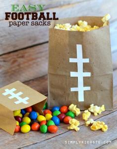 
                    
                        If you're looking for a simple and cute way to serve popcorn for game day or a birthday party, these Football Paper Sacks are super easy and inexpensive!
                    
                