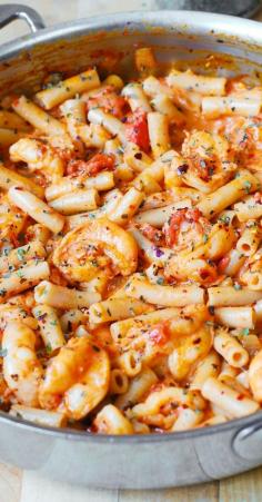 
                    
                        Spicy Shrimp Pasta in Garlic Tomato Cream Sauce ~ this pasta has everything you crave for in an Italian pasta: easy creamy tomato sauce made from scratch, seafood, and spices (basil, oregano, crushed red pepper)
                    
                