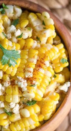 Chili Lime Sweet Corn Salad - sweet corn tossed with fresh lime, chili powder, cilantro, and queso fresco.