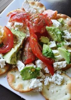 Feta, Avocado & Tomato -Topped Pita Chips - easy & healthy! Just top pita chips with feta, avocado, tomato, lemon juice & dill.