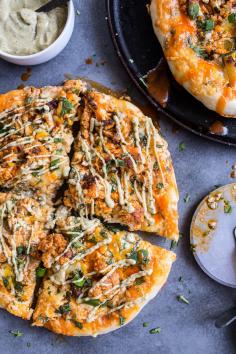 
                    
                        Buffalo Roasted Cauliflower Pizza with Chipotle Blue Cheese Avocado Drizzle | halfbakedharvest.com Half Baked Harvest
                    
                