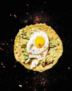
                    
                        For these chickpea crepes with egg and avocado: top a crepe with 1/2 an avocado mashed with a fork and 1 olive-oil-fried egg. Squeeze 1 lemon wedge over the crepe, sprinkle with salt and Aleppo pepper, and serve.
                    
                