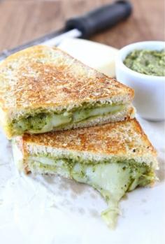 
                    
                        Parmesan Crusted Pesto Grilled Cheese Sandwich Recipe on twopeasandtheirpo... The BEST grilled cheese sandwich!
                    
                