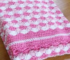 Pretty crocheted baby blanket. Inspiration only as link doesnt take u at all to a pattern. Lion brand has one tho called ocean waves baby afghan on their site!!!