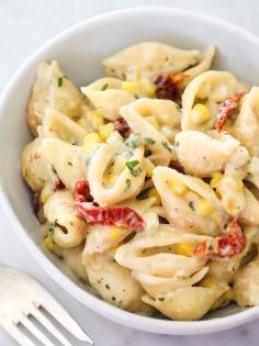 stovetop pesto macaroni and cheese with corn and sun dried tomatoes