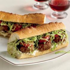 
                    
                        Spicy Pork Po'Boys | In Louisiana, a po'boy is a soft baguette filled with either fried seafood or meat. Melissa Rubel Jacobson makes her po'boys with juicy grilled pork patties, topped with lettuce, tomato and a crunchy-creamy pickle-and-shallot mayonnaise.
                    
                