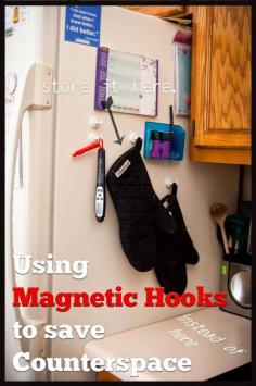 How to save kitchen countertop space, how to save kitchen drawer space, using magnetic hooks....maybe on oven door, too
