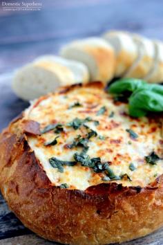 
                    
                        Cheesy Pizza Dip Bread Bowl - the cheesiest, most delicious 'dip' you'll ever eat!
                    
                