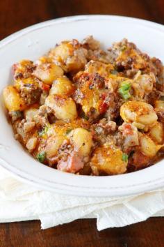 
                    
                        Oh my gosh you HAVE to try this Cheeseburger Gnocchi recipe!! Pillowy soft potato dumplings (gnocchi) are toasted for a crunchy skin, but impossibly fluffy middle. Then they're simmered with seasoned beef and cheese for a 15-minute, one pot meal that everyone will FLIP over!!! So good!! :)
                    
                