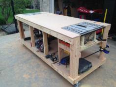 
                    
                        Workbench with built-in table saw and router locations. I would love for Robert to have this.
                    
                