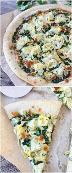 
                    
                        Spinach Artichoke Pesto Pizza on twopeasandtheirpo... One of my all-time favorite pizzas!
                    
                
