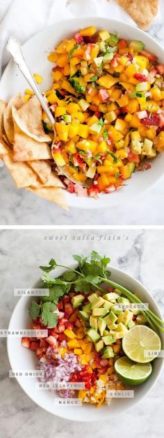
                    
                        Mango Salsa with Strawberries and Avocado is a light topper for fish, chicken, pork and of course, CHIPS! | foodiecrush.com
                    
                