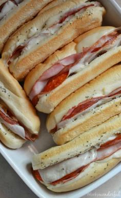 
                    
                        Hot Italian Sandwiches baked in the oven. Meaty Cheesy Sub Sandwiches, great for feeding a large crowd!
                    
                
