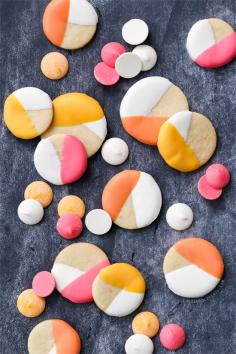 
                    
                        Easy spring cookie decorating idea: dip sugar cookies in colored candy coating for a trendy colorblock effect.
                    
                