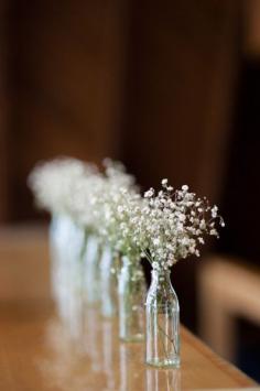 
                    
                        Keep it simple. Small jars with delicate flowers.
                    
                
