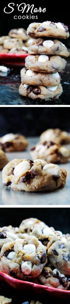 
                    
                        Soft and Chewy S'more Cookies - chewy, graham cracker cookies nestled with gooey chocolate and slightly toasted marshmallows. My husbands FAVORITE COOKIE! | Carlsbad Cravings
                    
                