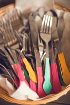 
                    
                        Get different patterns of inexpensive silverware and dip the ends into fun colored paints.
                    
                