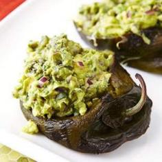 
                    
                        Guacamole-Stuffed Poblano Peppers - A cousin of chile rellenos, these roasted stuffed poblano peppers are filled with guacamole and shredded lettuce. Serve this healthy Mexican recipe as a light lunch or go all out and serve it as a side dish with tacos or enchiladas for dinner.
                    
                