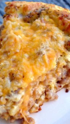 
                    
                        Monterey Sausage Pie ~ A cheesy blend of eggs, sausage, and other staple ingredients that’s great for either dinner or breakfast!
                    
                