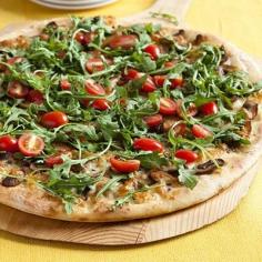 
                    
                        Get your kids to eat their veggies by putting them on top of their favorite meal- pizza! This arugula tomato pizza will have them asking for more leafy greens.
                    
                